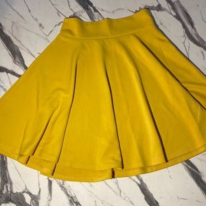 This is a long flowy yellow skirt.